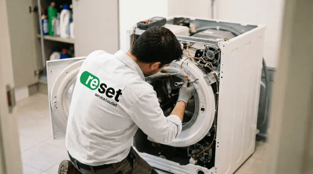 Technician repairing a washing machine